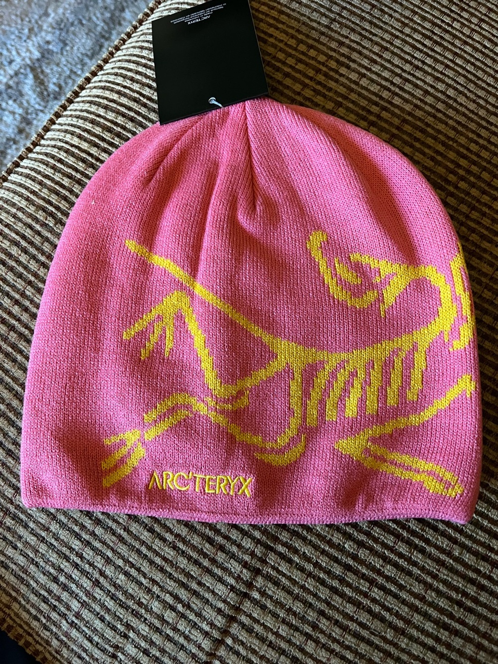 Arc'teryx Pink Beanie with Yellow Logo Graphic